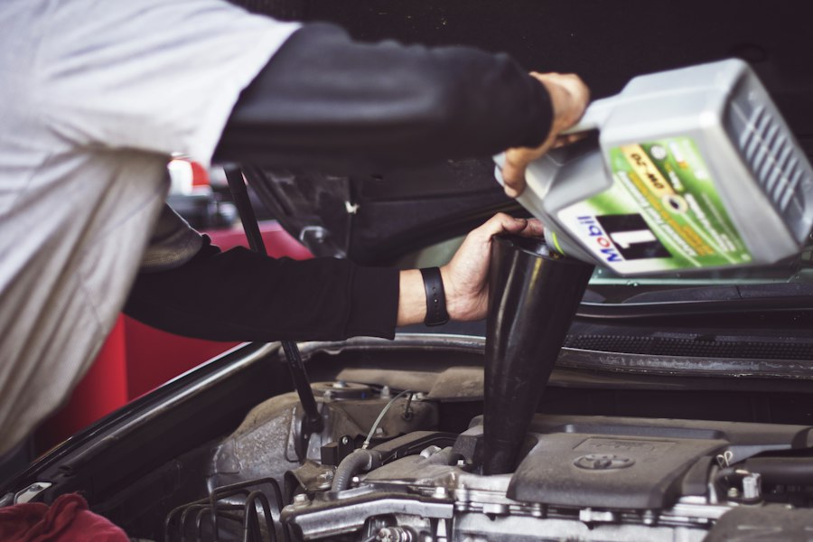 Mechanic working on vehicle brake components