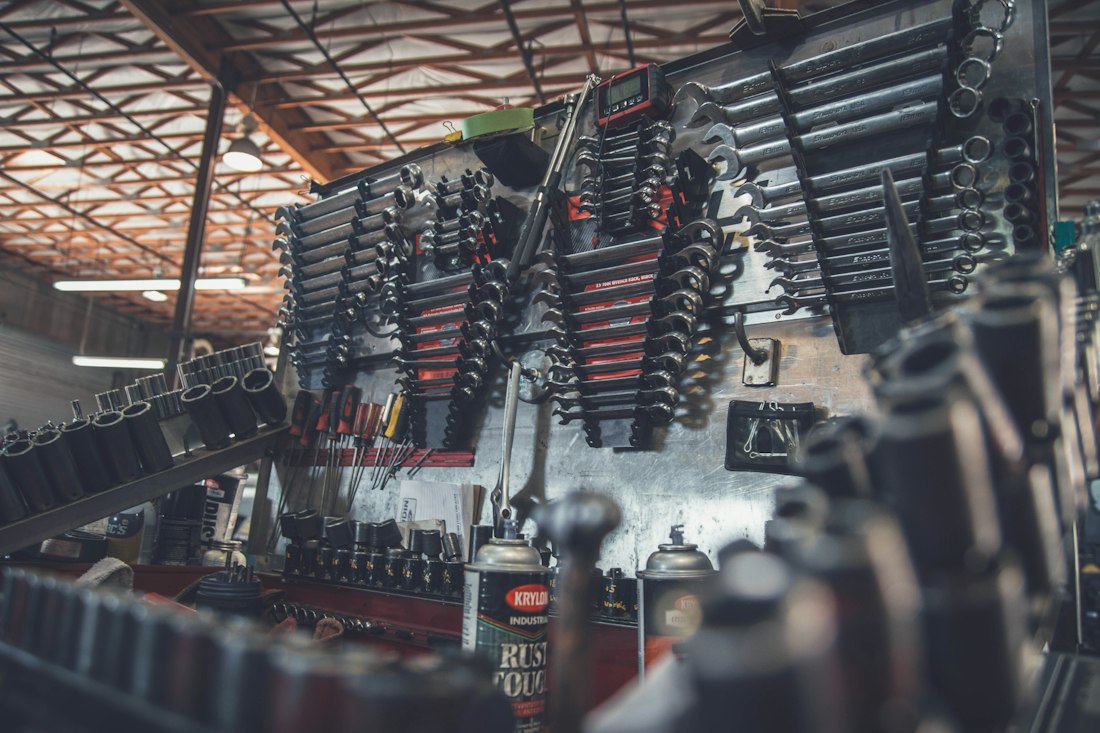 Modern automotive workshop with vehicles